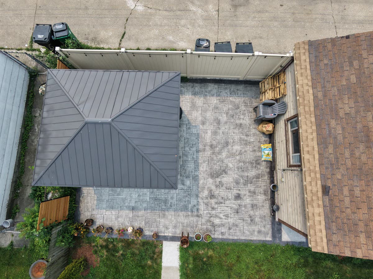Overhead drone photo showing gazebo roofline and property boundary