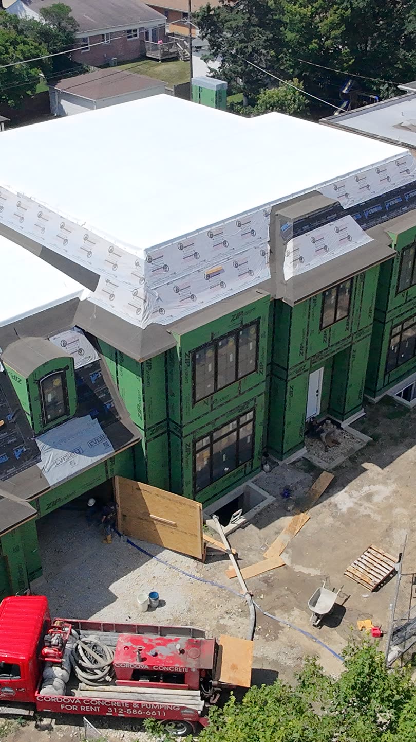 Vertical-format crop of a construction aerial photo, reframed for social